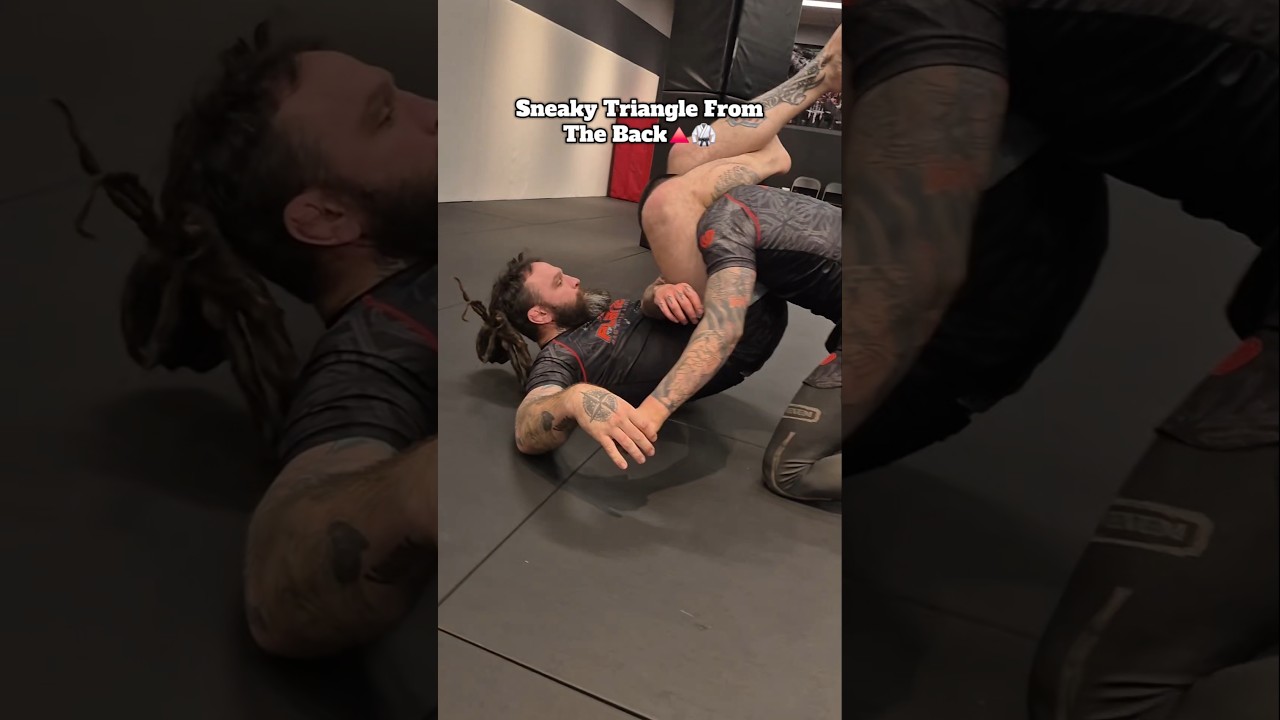 Triangle from back control 🔺Trap both arms. Lay back. Pull them into it.