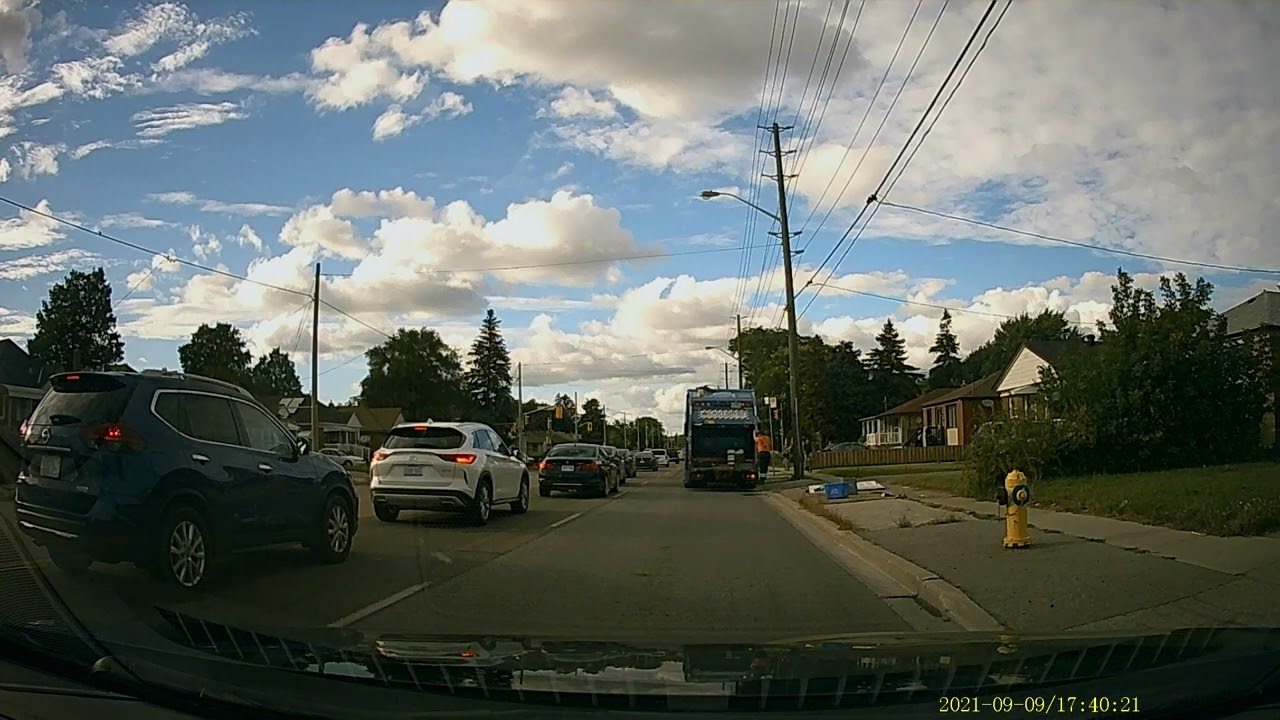 Female Employee City of Toronto Garbage Truck Bulk Pick-Up