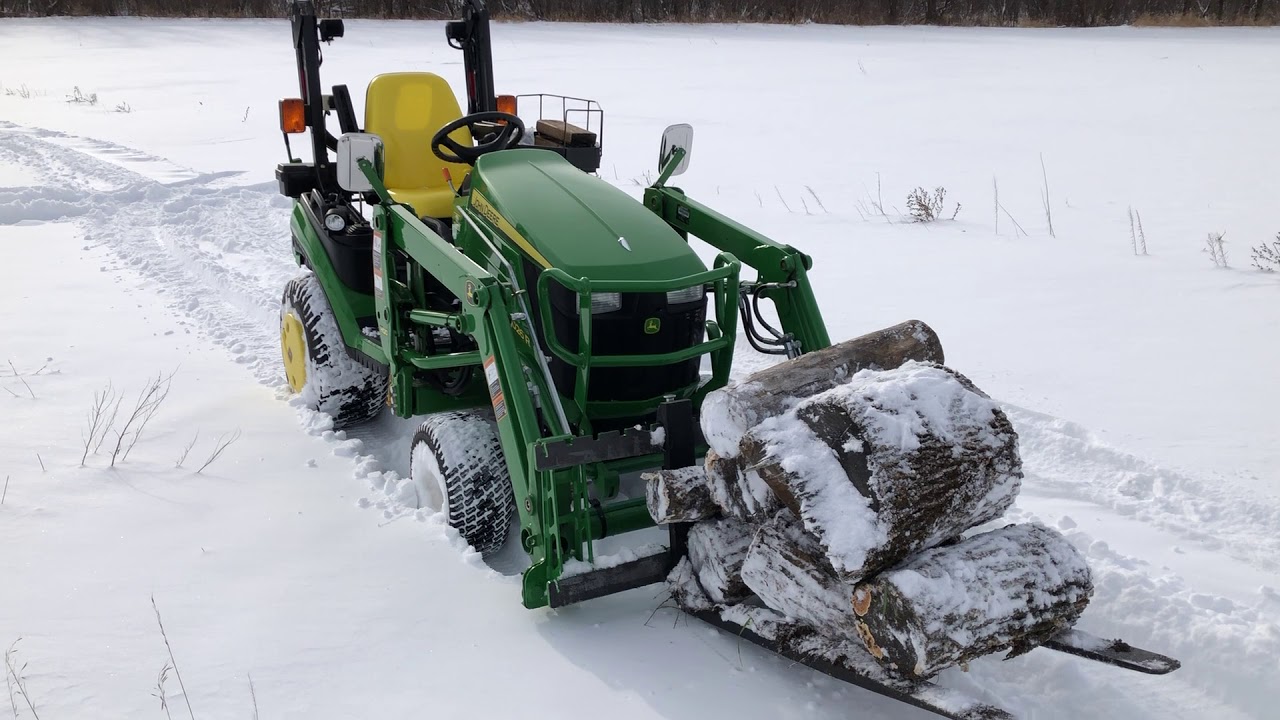 1026R running turf tires through the snow (surprised me, no chains needed....yet)