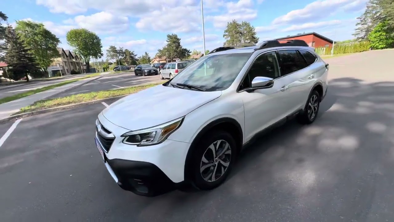 Subaru Outback Limited XT 2021 walk around and drive on the road .