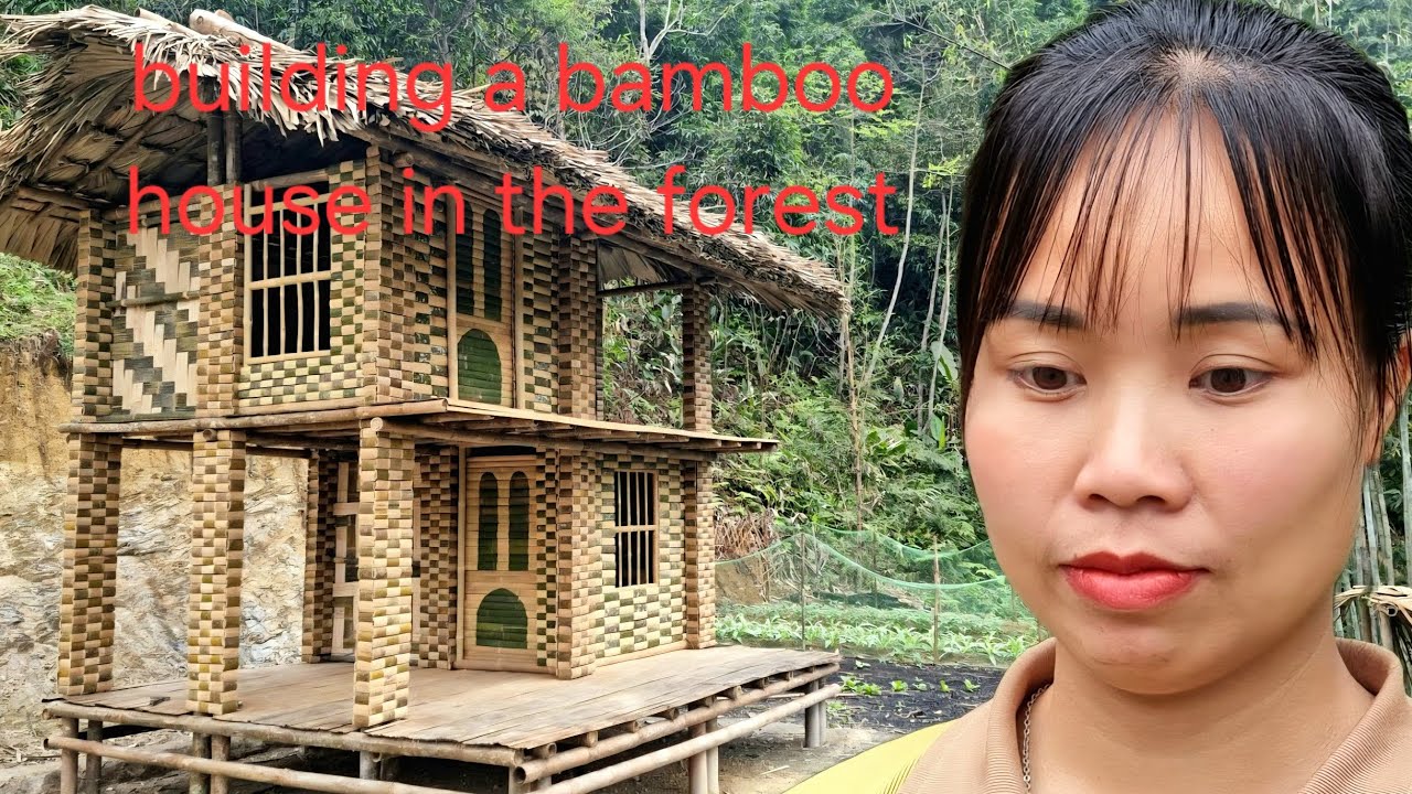 The woman erected the partitions and completed the two-story bamboo house.