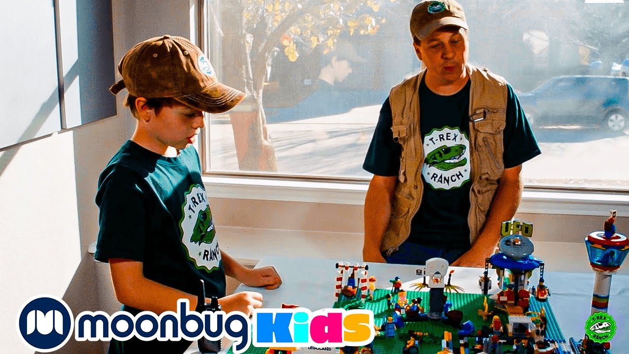 Dinosaur Toys at Legoland California | T-Rex Ranch Adventures | Kids Songs | Moonbug Kids