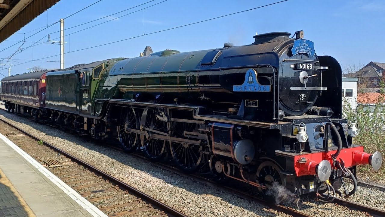 TORNADO 60163 Returns to the mainline at Warrington Bank Quay station from Carnforth to Coleham