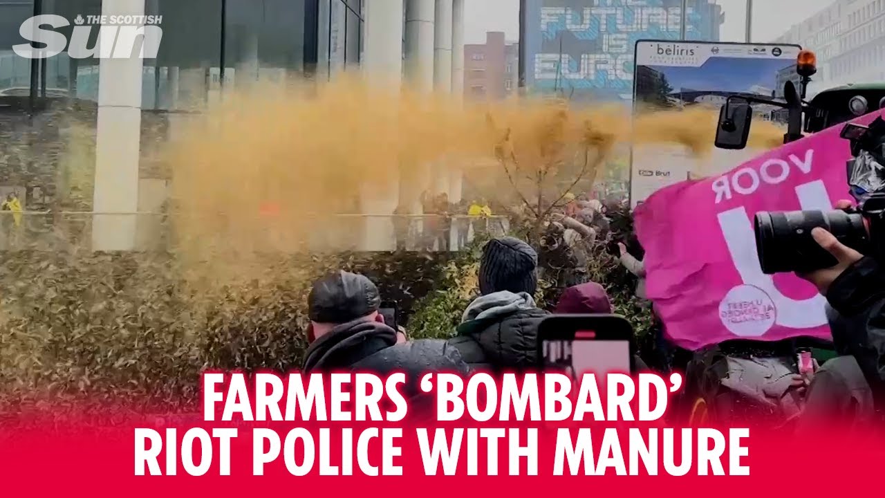 Protesting farmers 'bombard' riot police with manure as they clash in Brussels