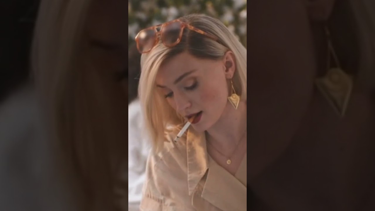 Sophie Turner is Joan, smoking all the cigarettes.