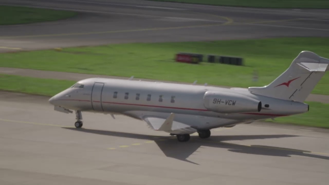 Zurich Airport private jet Vistajet Malta Bombardier Challenger 300 BD-100 1A10 9H-VCW taxiing.