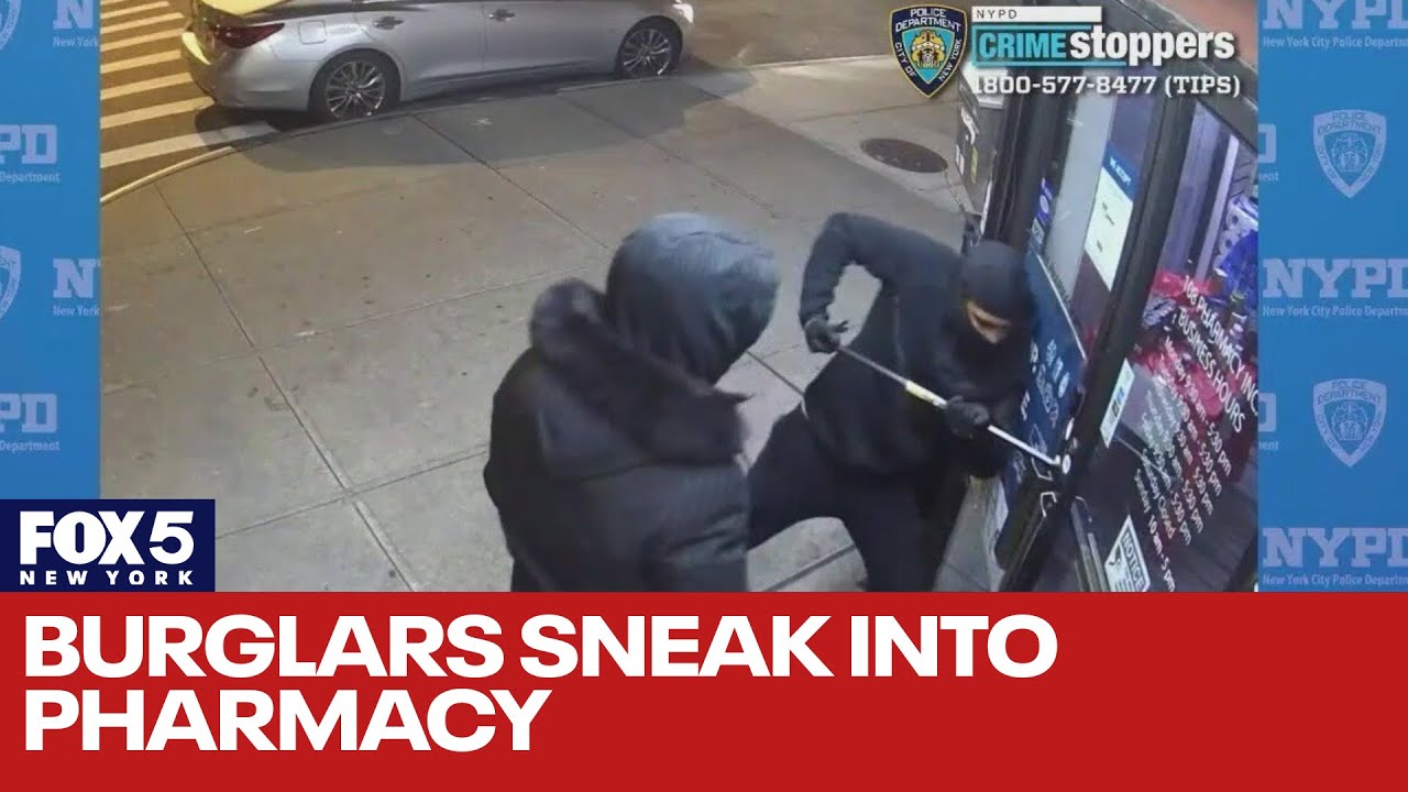 Watch burglars struggle to break into pharmacy