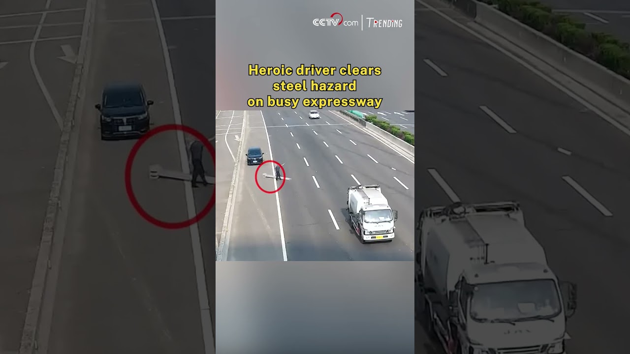Heroic driver clears steel hazard on busy expressway