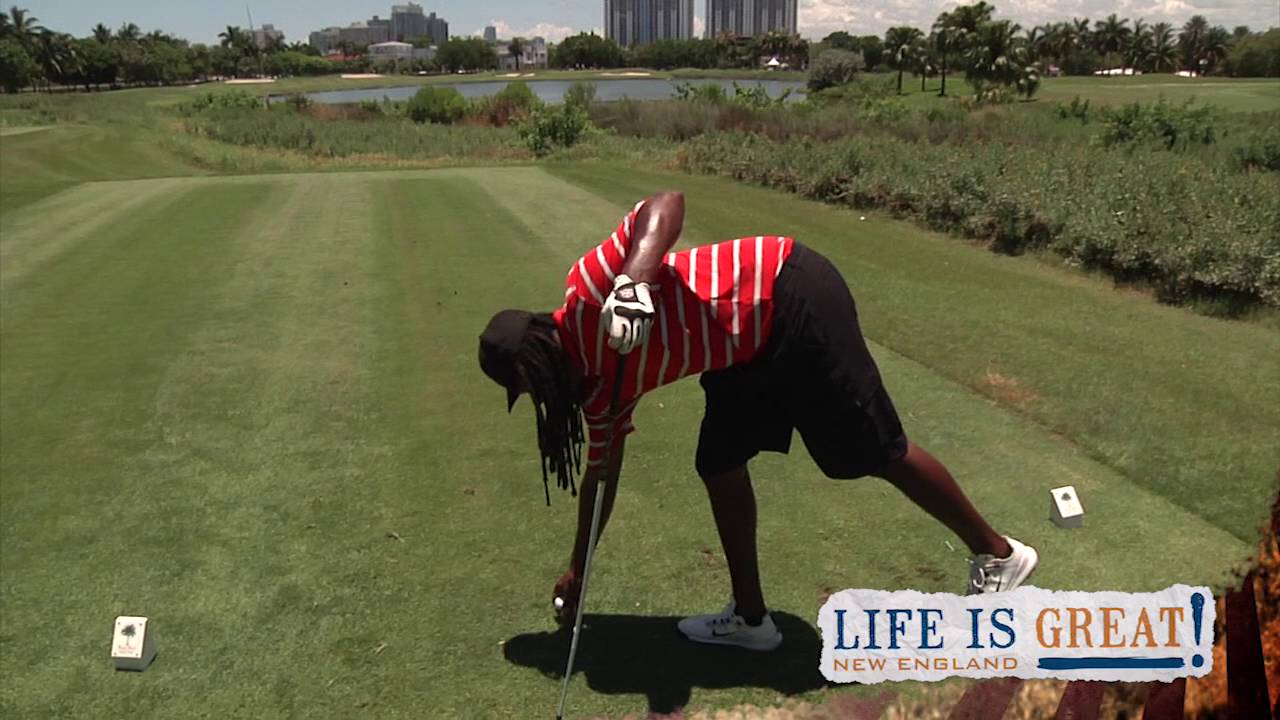 Golf's Longest Driver Steve Monroe gets a little help from Chuck Nilosek