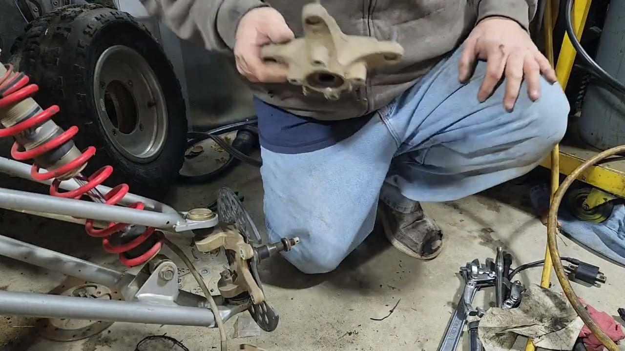 2006 2007 polaris outlaw 500 front wheel bearing replacement