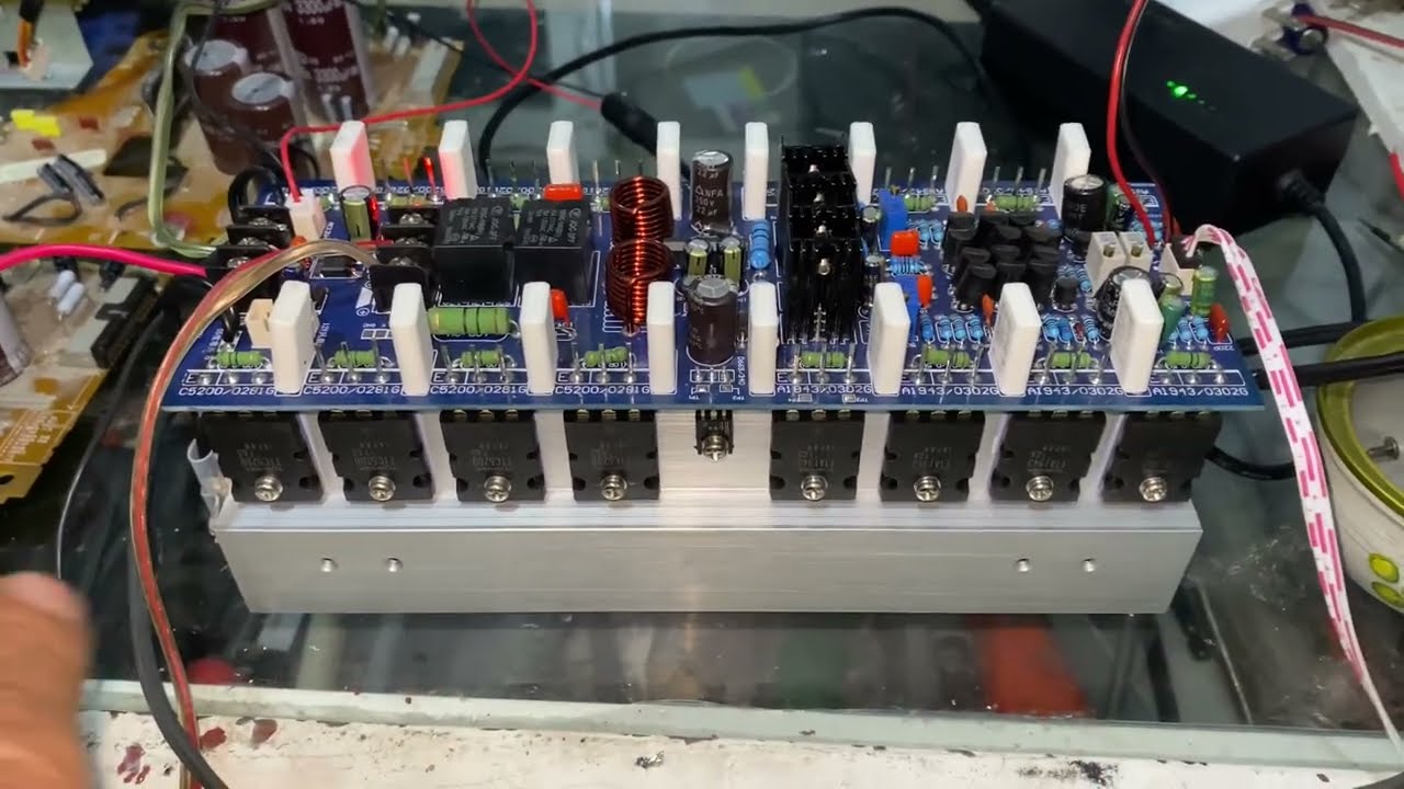 Amplificador chino de 400 Watts RMS X2, diseño de fuente de alimentacion simetrica.