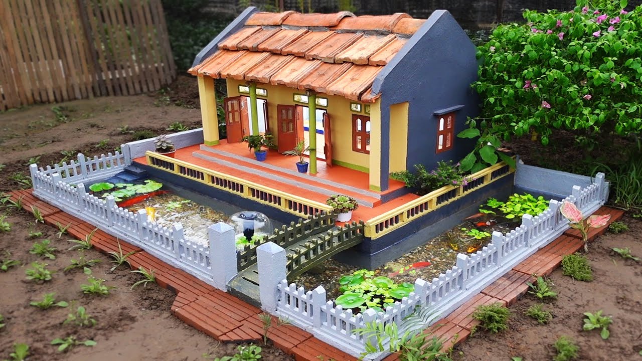 Make your garden more beautiful with a mini house and aquarium