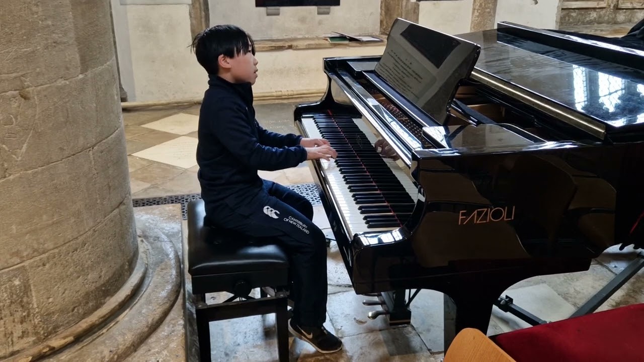 Prelude in G major by J. S. Bach (BWV 884), played by Alexander at cathedral assembly