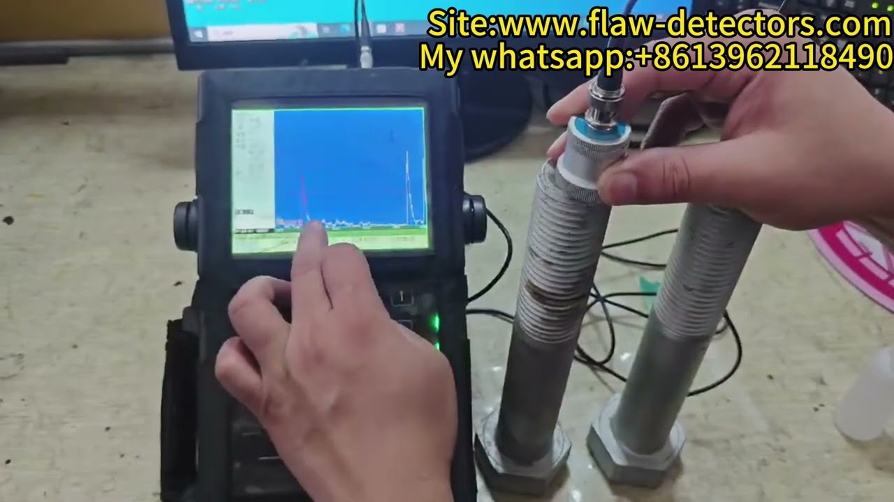 Non-destructive ultrasonic inspection of large-scale bolts using a portable device