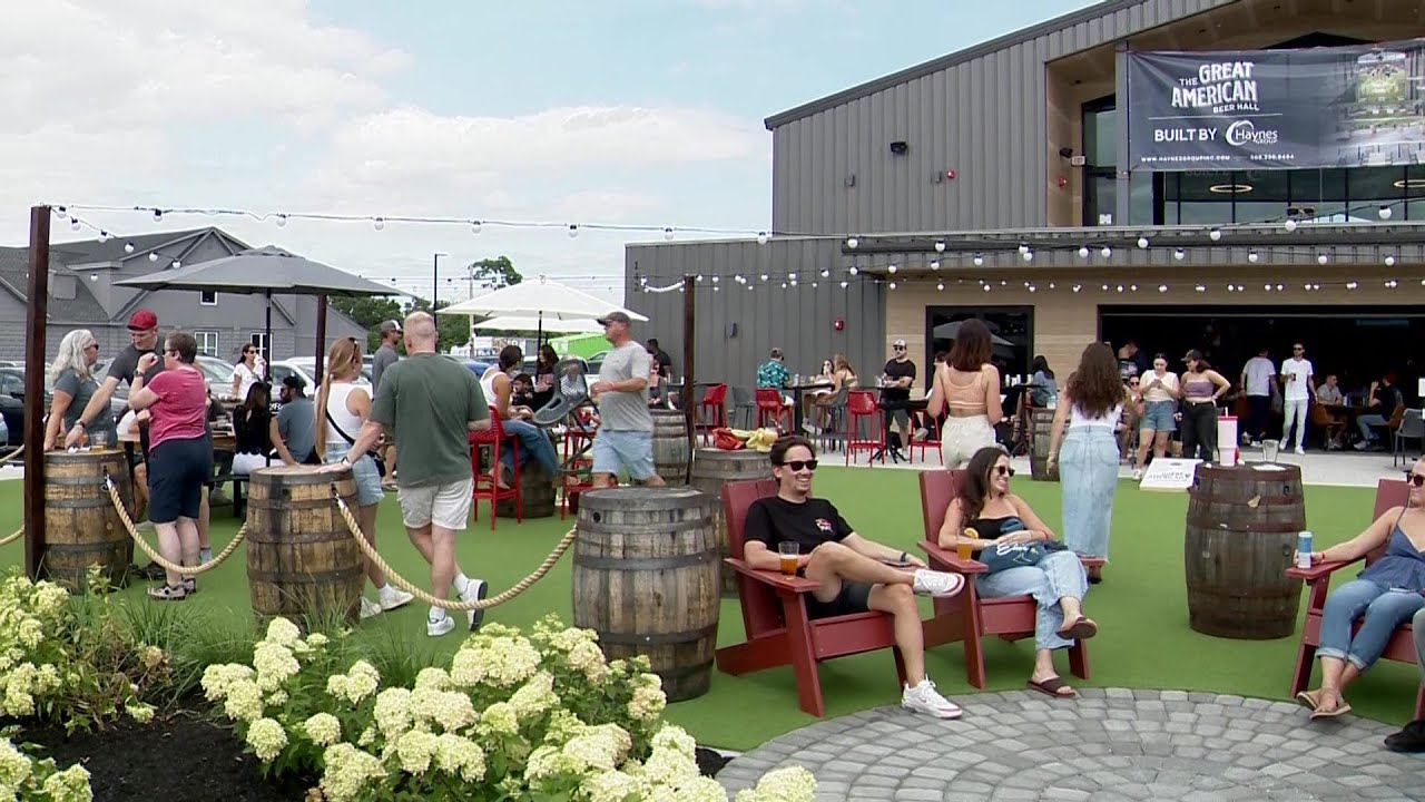 Crowd packs new 17,000-square-foot Mass. beer hall on opening day
