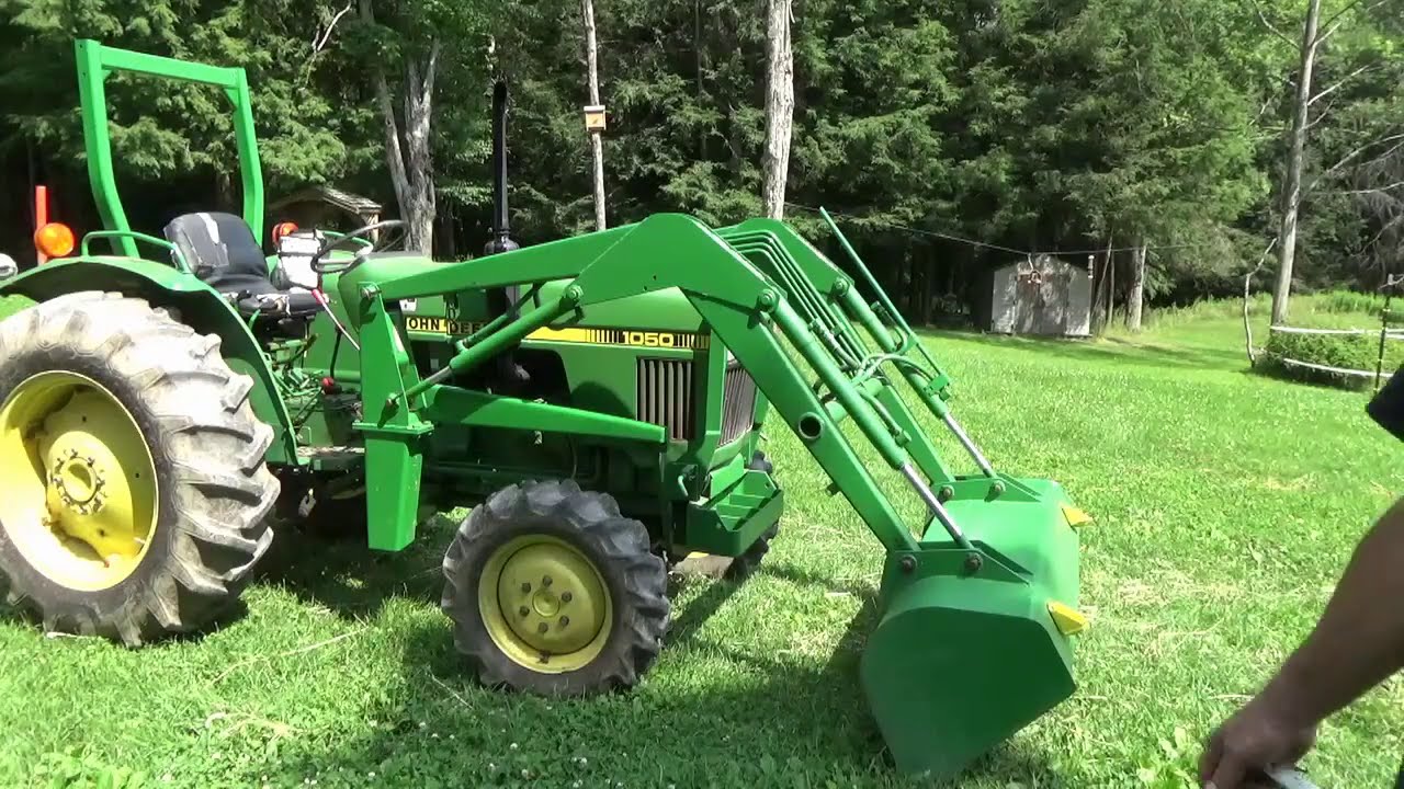 Замена гидравлического насоса John Deere 1050