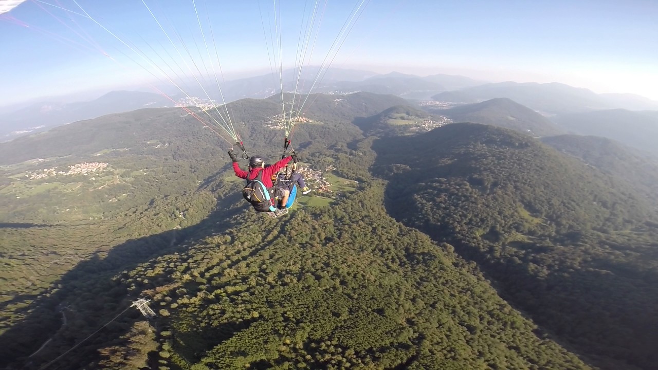 Tandem paragliding with a chase cam - Monte Lema - FlyTicino