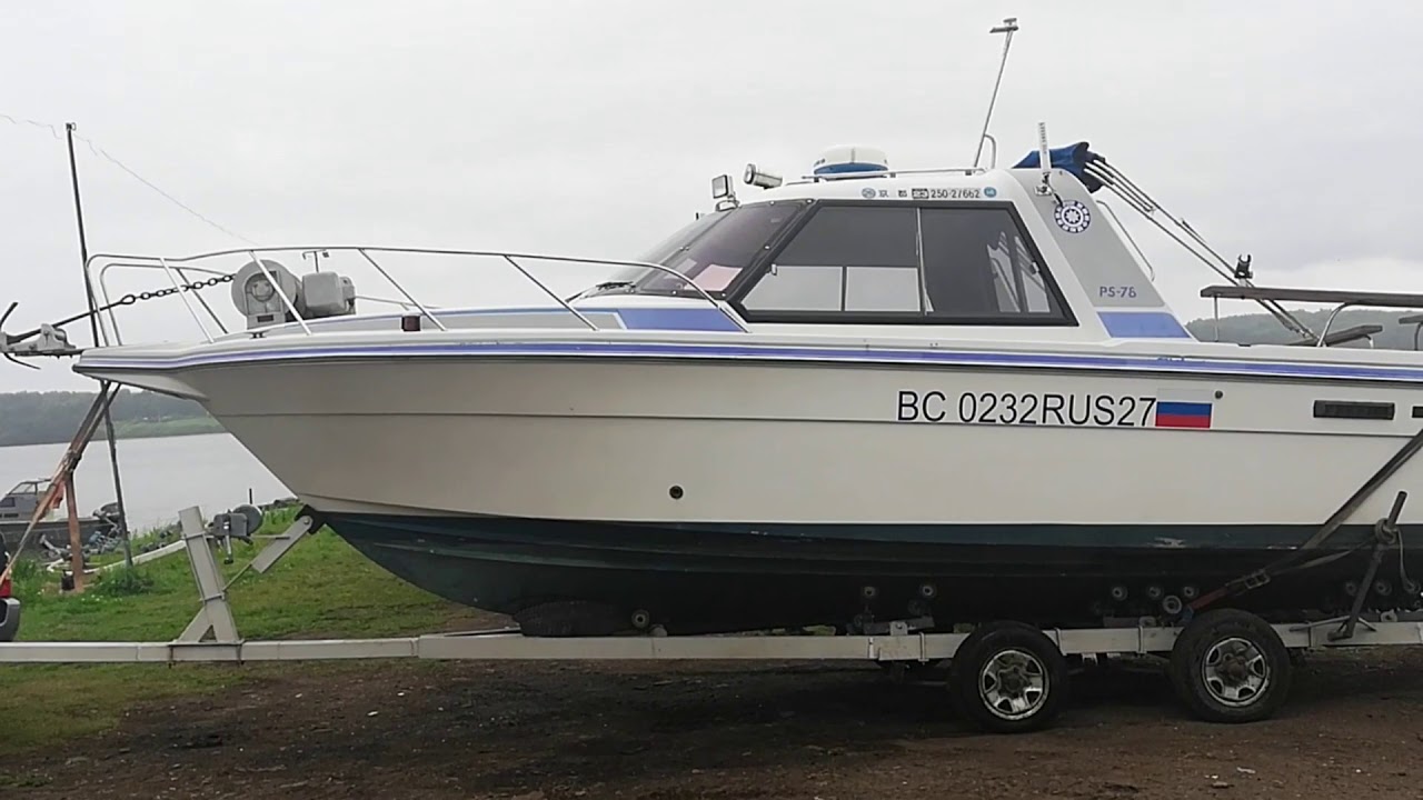 Спуск катера Nissan 780  при помощи Nissan Safari