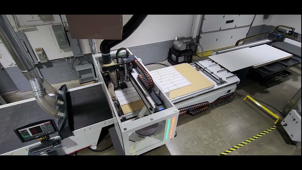 Nutek Machinery Phantom 5x10 with auto labeling by KRC CNC, dust collection Nuvac 5000 by Modesta