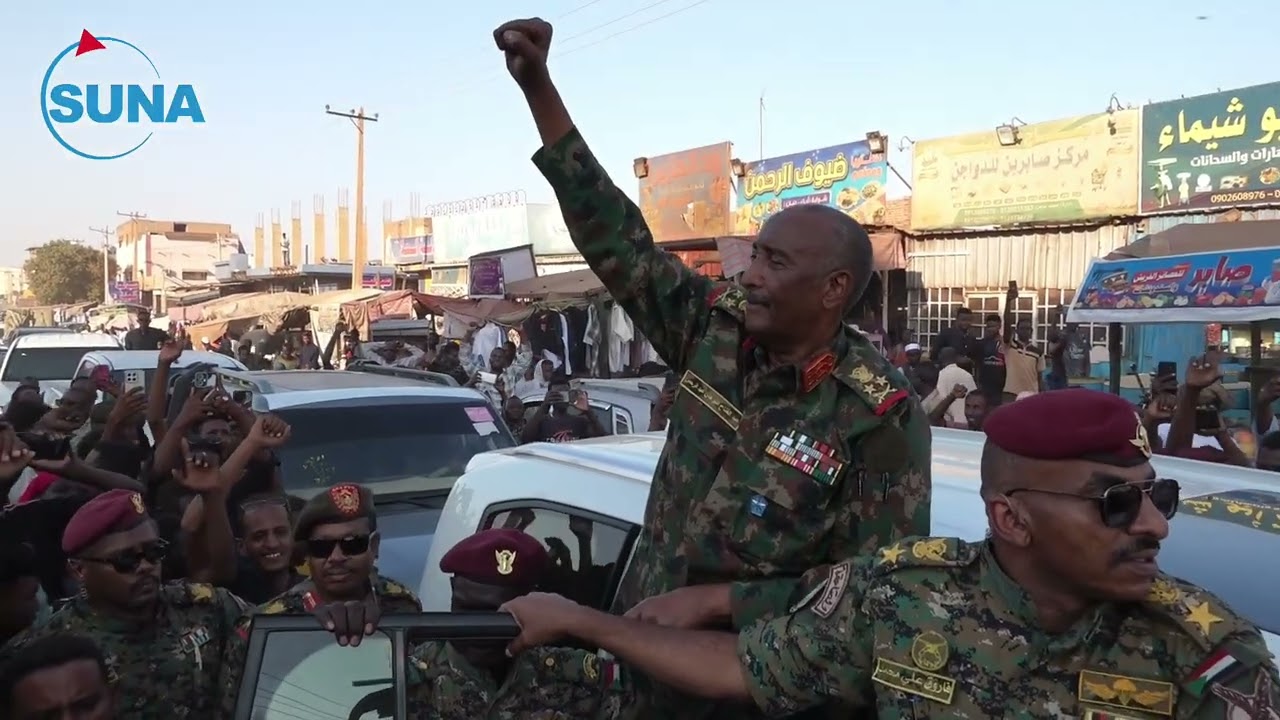 Al-Burhan amidst spontaneous crowds in Omdurman, Garb-Alharat