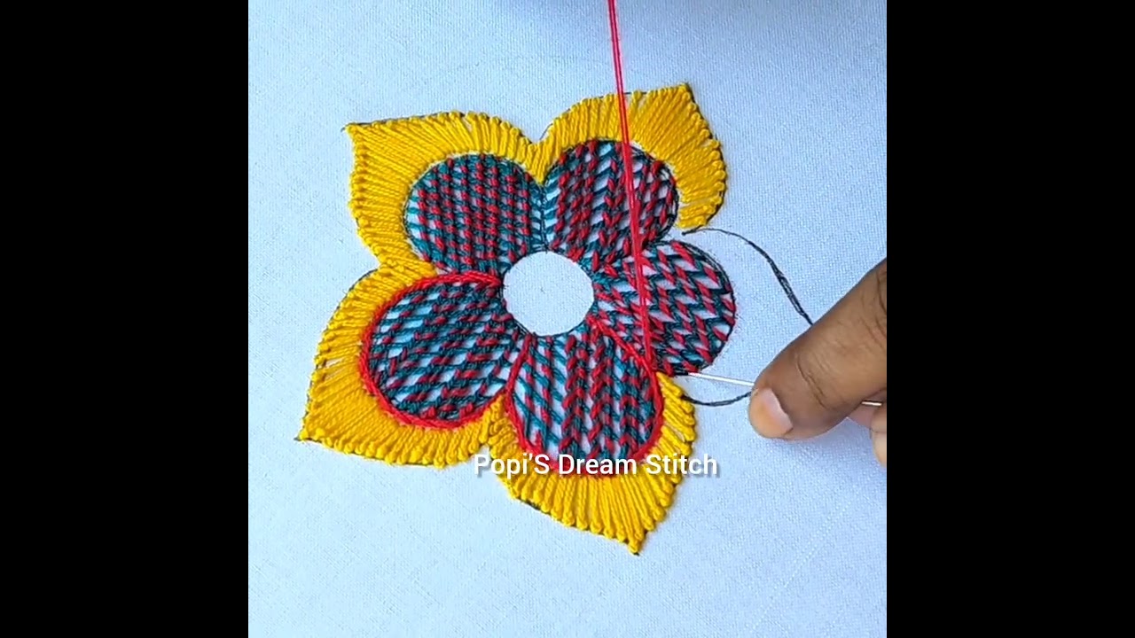 Abeautiful mix of vibrant stitches creating a bright and cheerful floral pattern🌼🌺❣️🪡 #reelsviralシfb