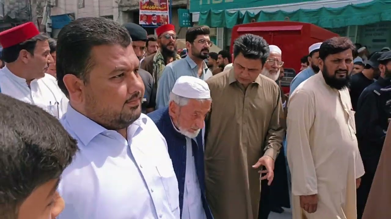 Haji Ghulam Bilour along with party workers doing Protest Against Disrespect of Holy Quran