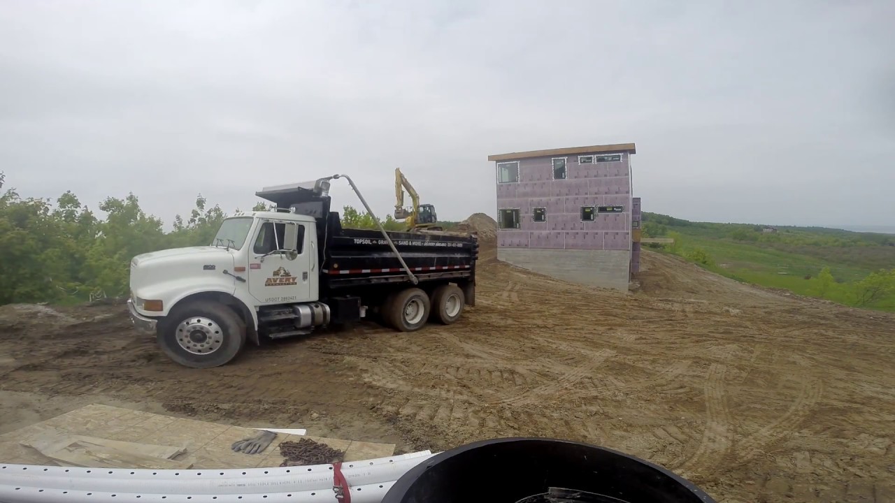 1500 CY of Fill to move and 1200 feet of driveway to build