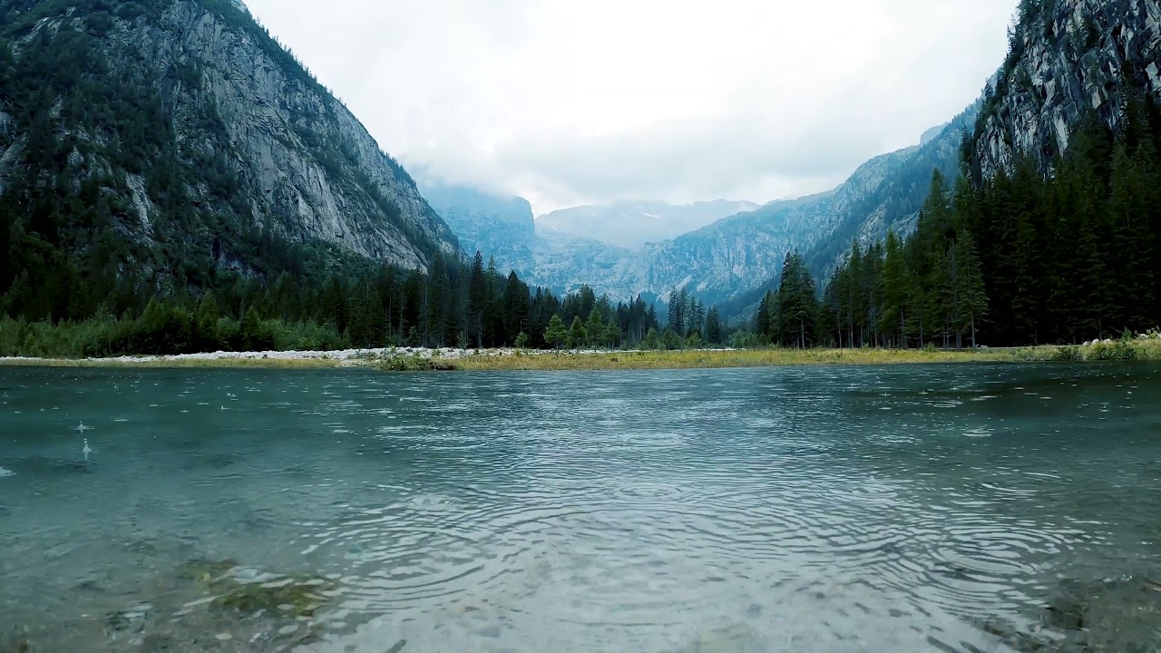 RAIN FALLING IN A LAKE IN SNOW-CAPPED MOUNTAINS - soothing sounds for virtual Relaxation (4K 2021)