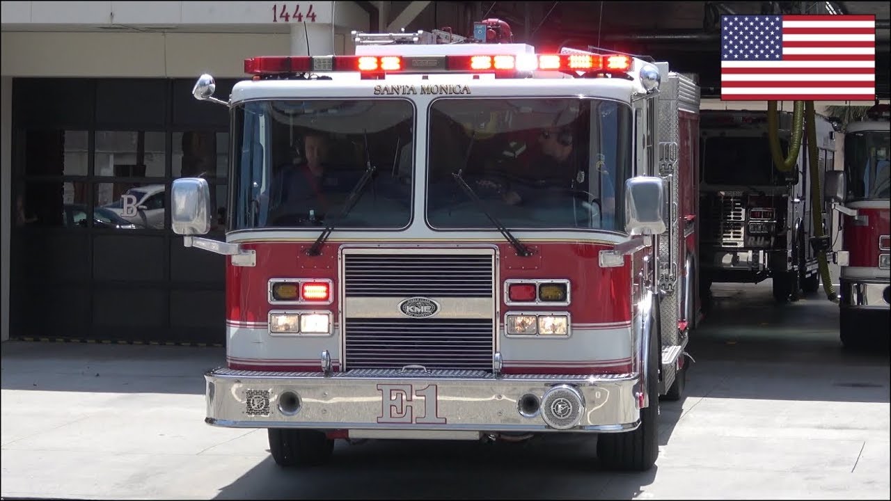Fire truck responding with Q siren and peace sign - Santa Monica FD