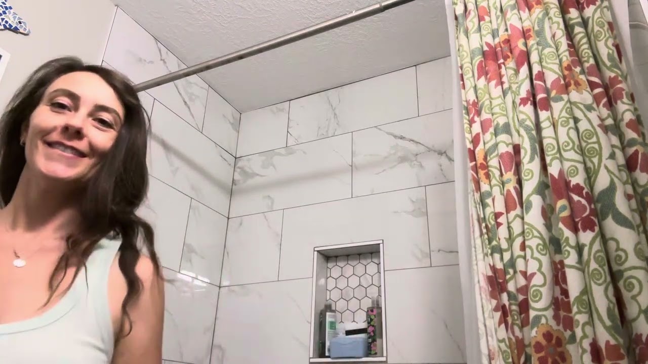 Hang up the shower curtain and liner with me.