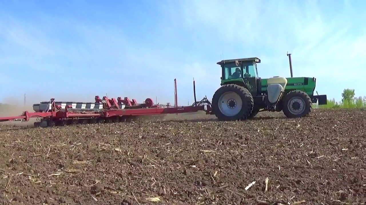 Planting Corn in Minnesota with a Deutz Allis 9170 tractor and a 16 row White Corn Planter
