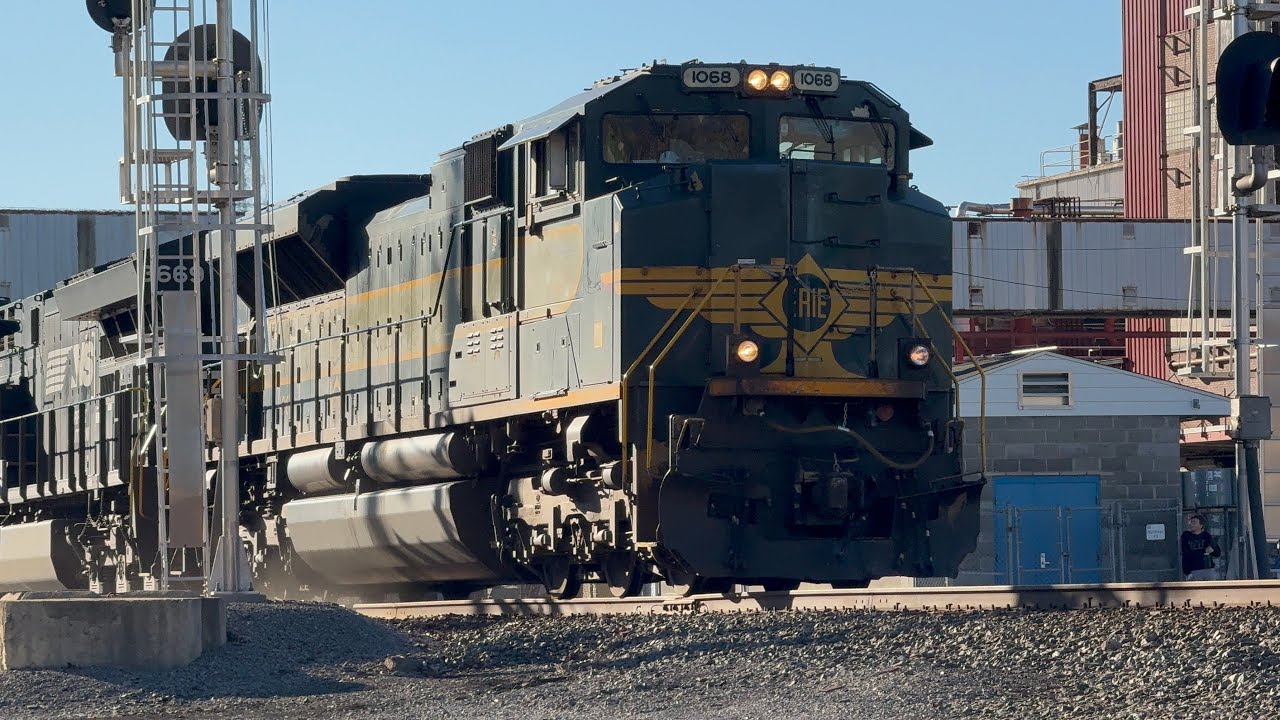NS 1068 (Erie), leads NS 38G-09 through colfax!