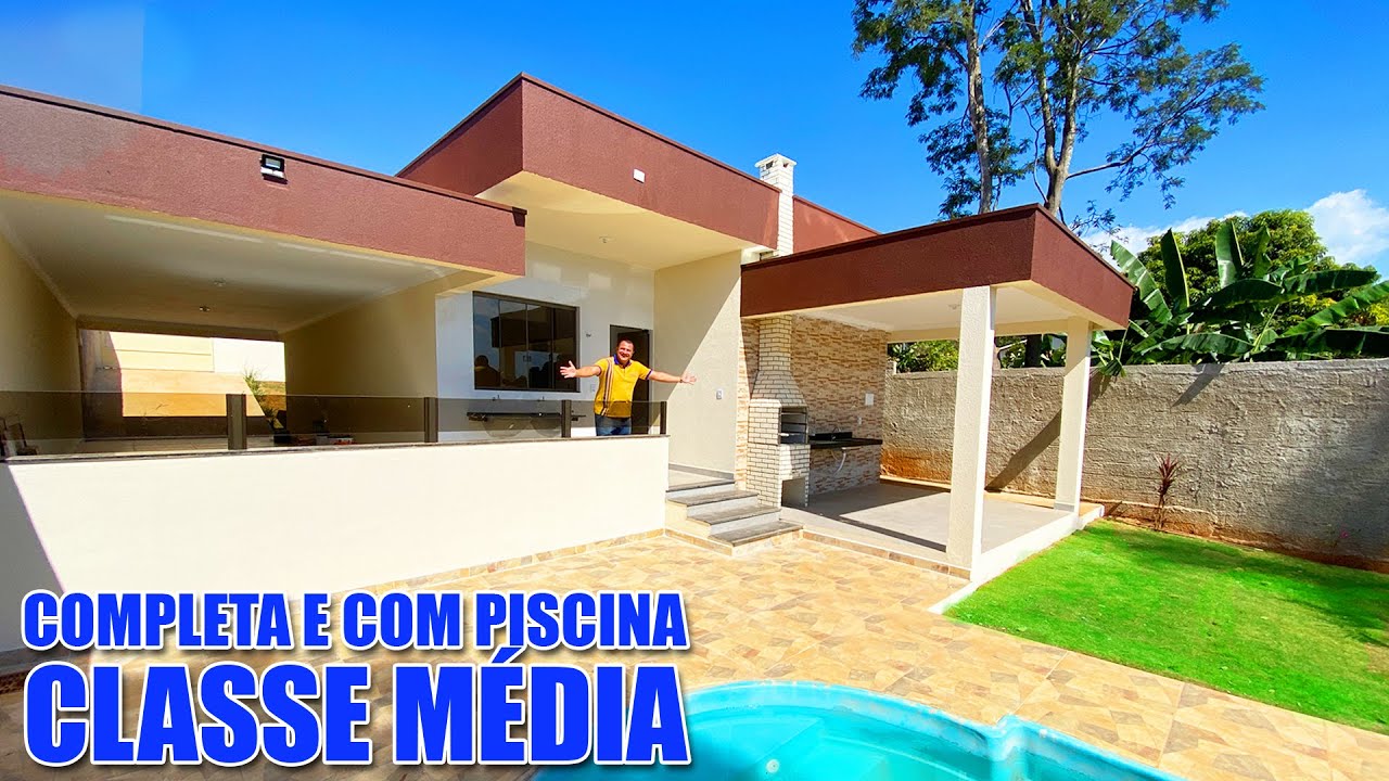 Êta casa ajeitada viu sô! Tem piscina, área gourmet, lote grande com ótimas possibilidades. 450 MIL
