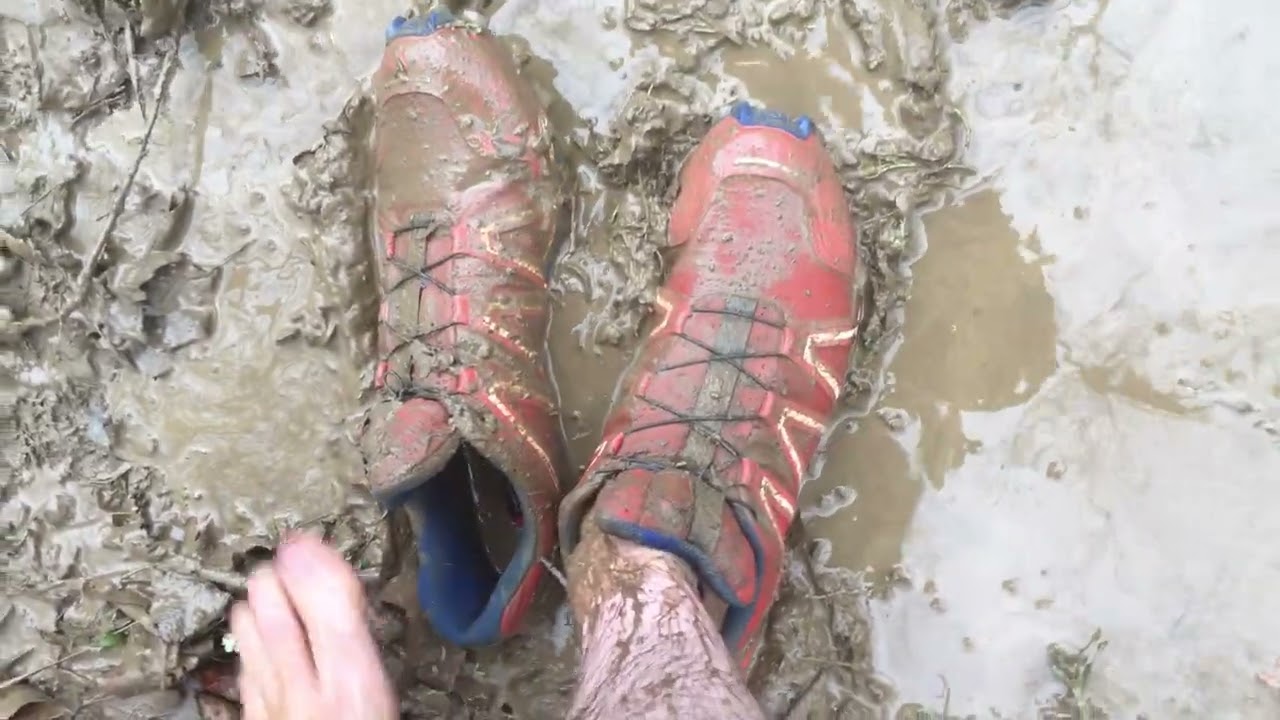 orange speedcross very muddy