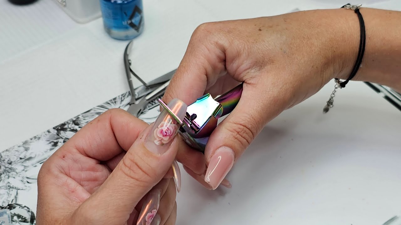 Removing nail extensions. Safe hard gel nails removal
