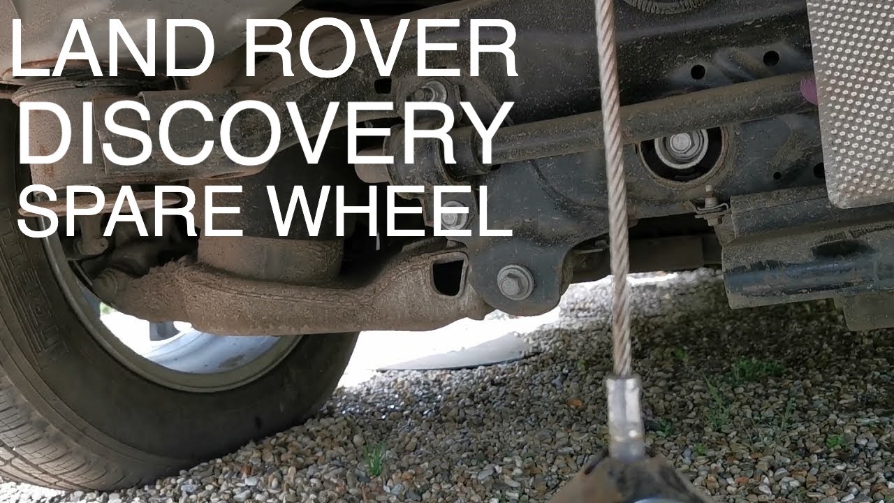Как опустить запасное колесо на Land Rover Discovery