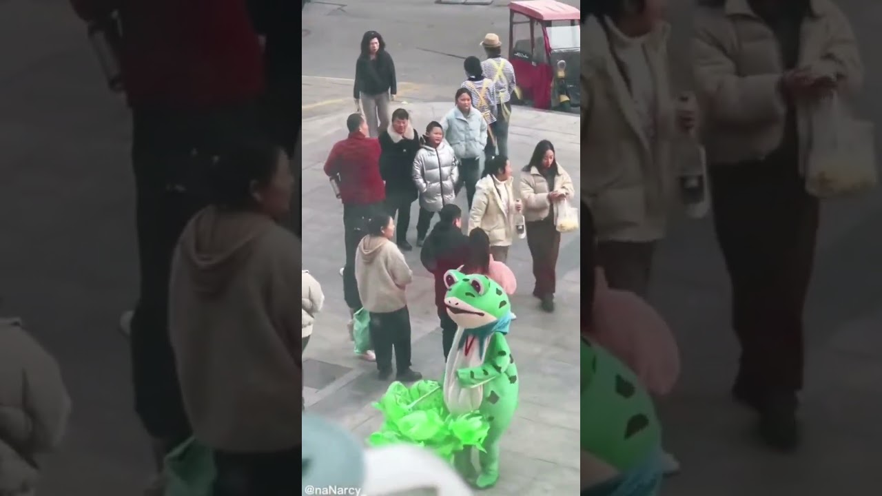 funny video of a man in a frog costume