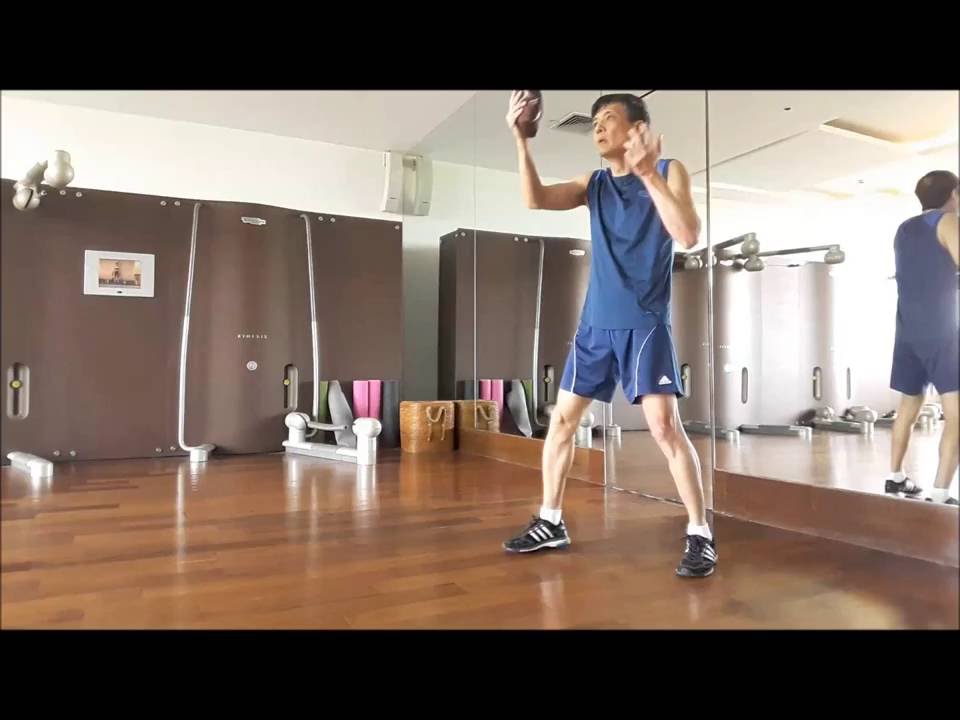 Urban Combatives solo pad training using a slam bag