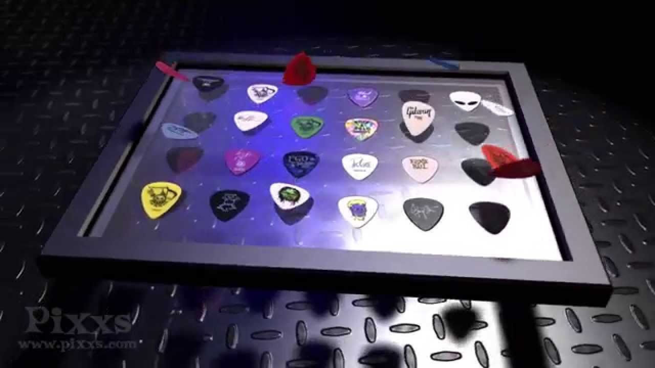 Pixxs Guitar Pick Displays Advertisement