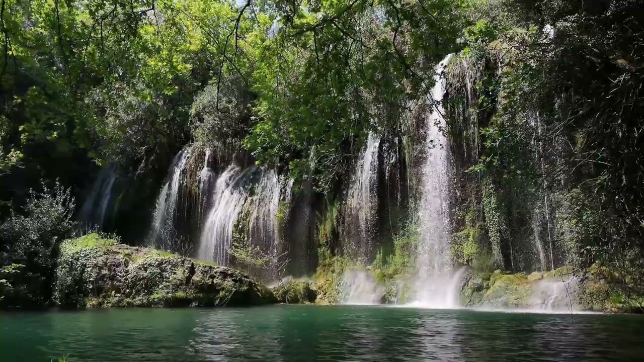Peaceful soundscape of water and rain and a relaxing landscape of waterfalls in the forest