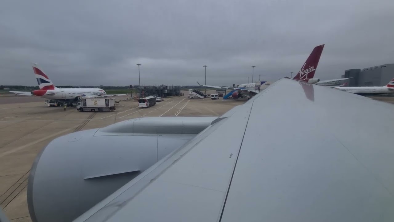 American Airlines Boeing 777-200 Takeoff from a very grey London Heathrow
