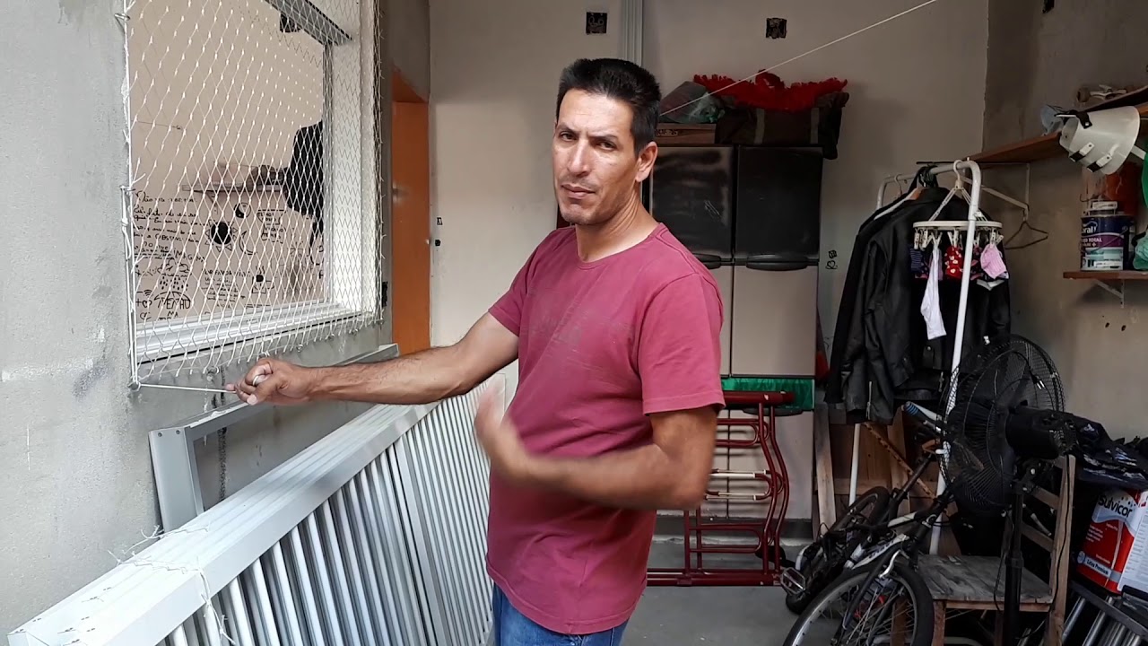 Como instalar uma rede de proteção em janela