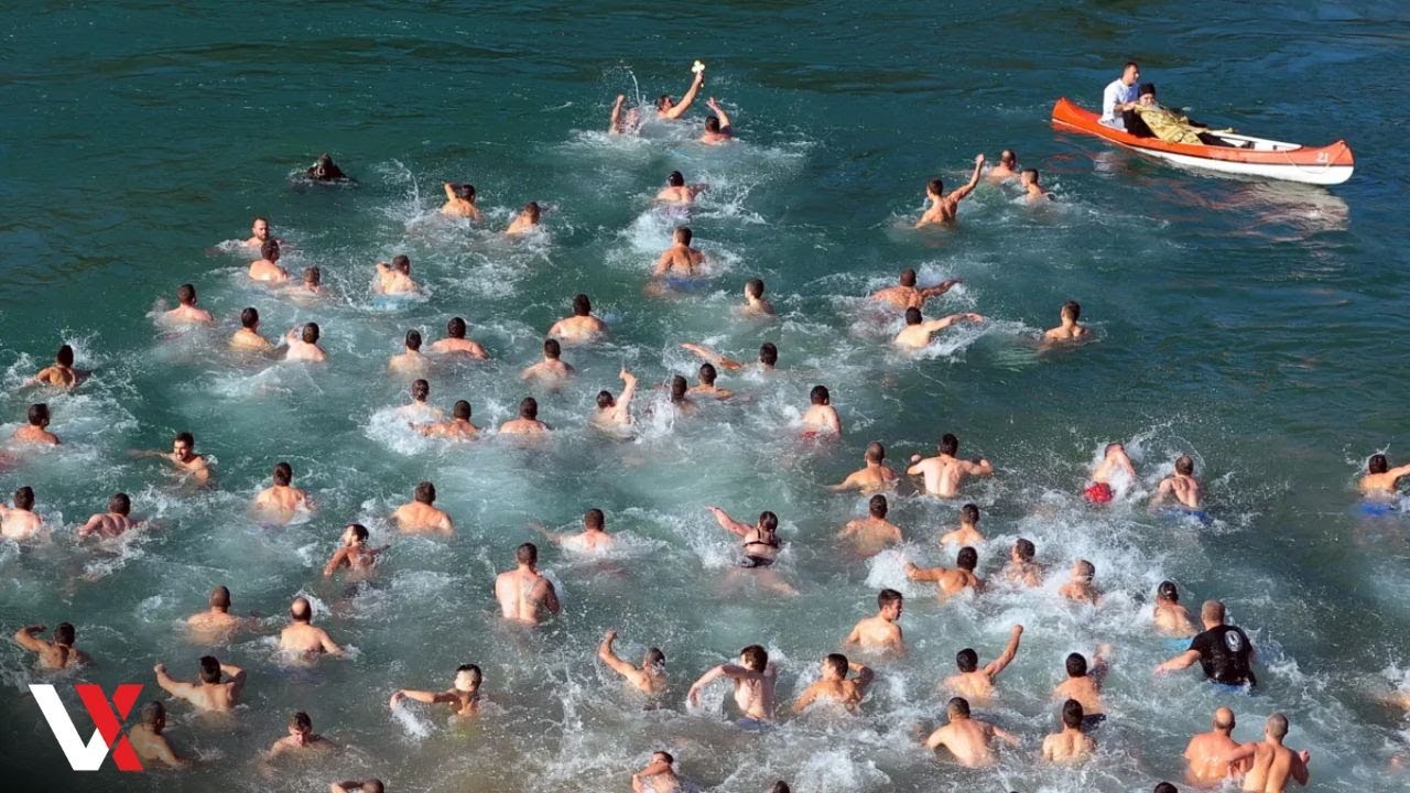 Orthodox Christians Jump Into Icy Waters In Balkans For “Epiphany” | VERTEX