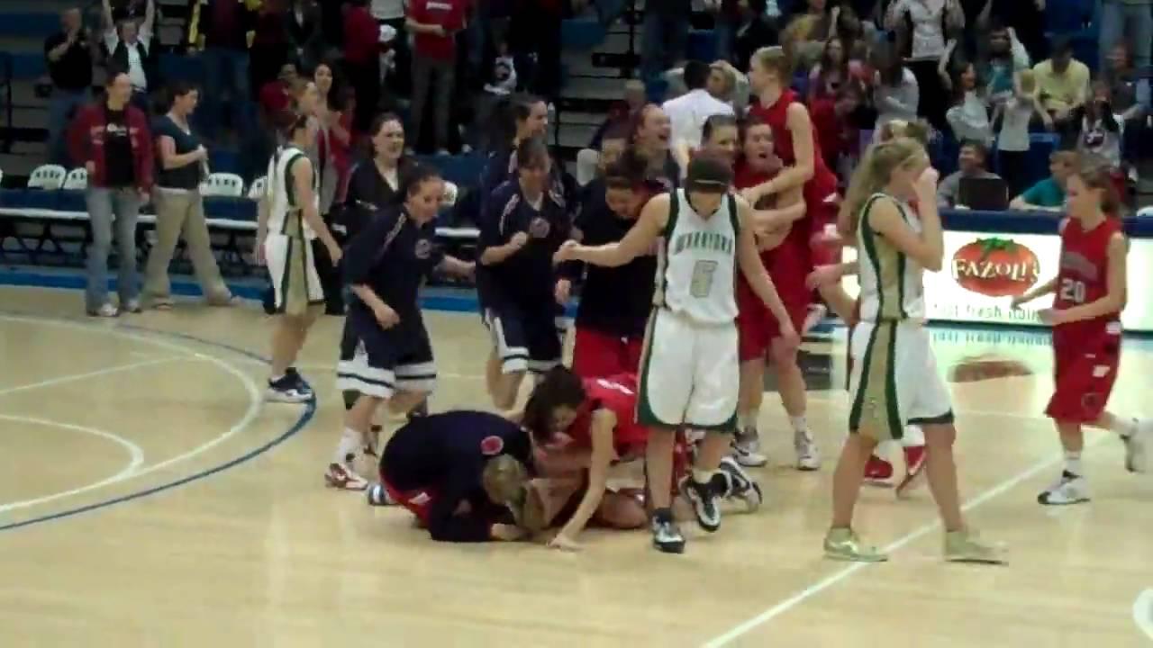 High school basketball: Lexi Eaton ( Springville Red Devils)  makes the game winning shot.