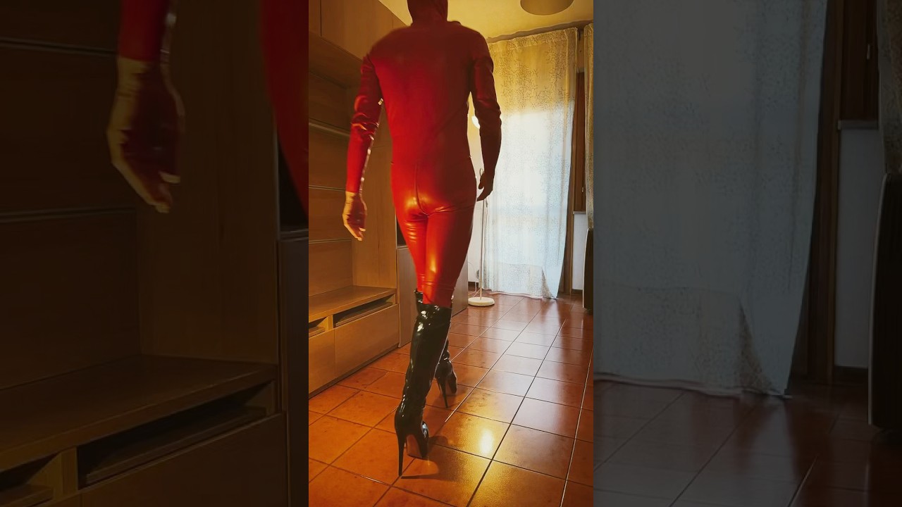 With the Red rubber catsuit from Latex Epicentre 
