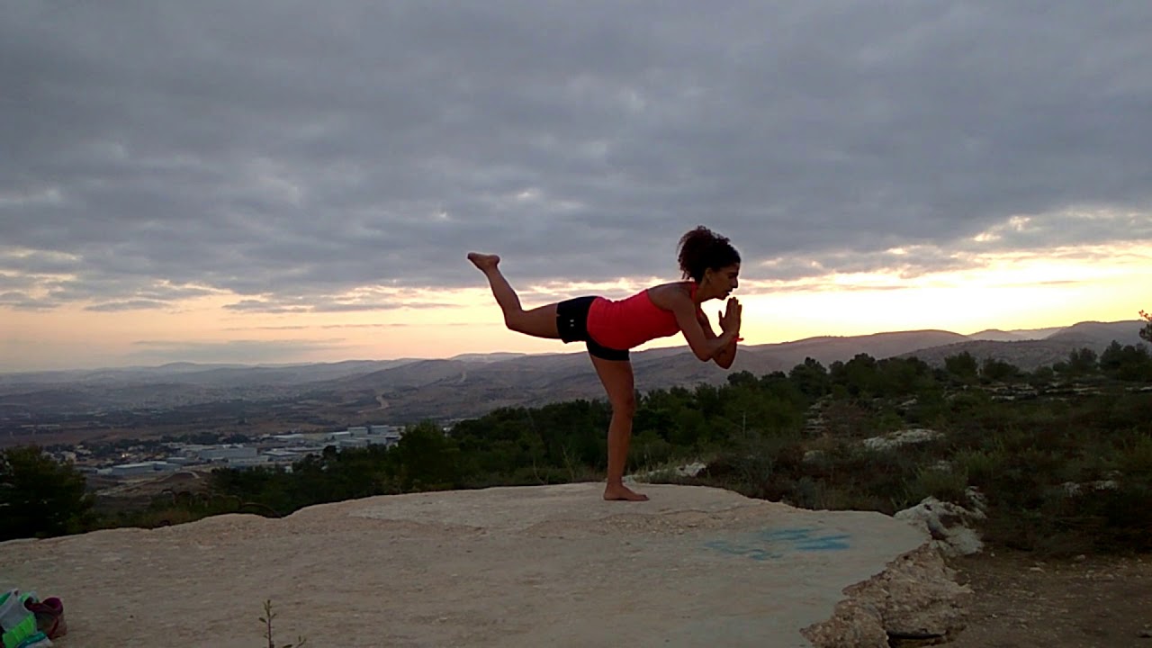 Yoga transitions at a beautiful sunrise
