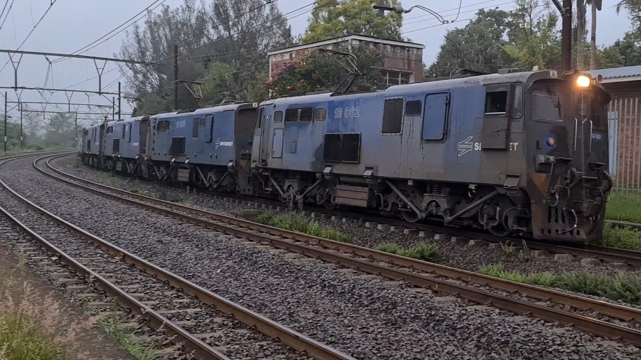 Spoornet class 18E locomotives stopping at Boughton station.