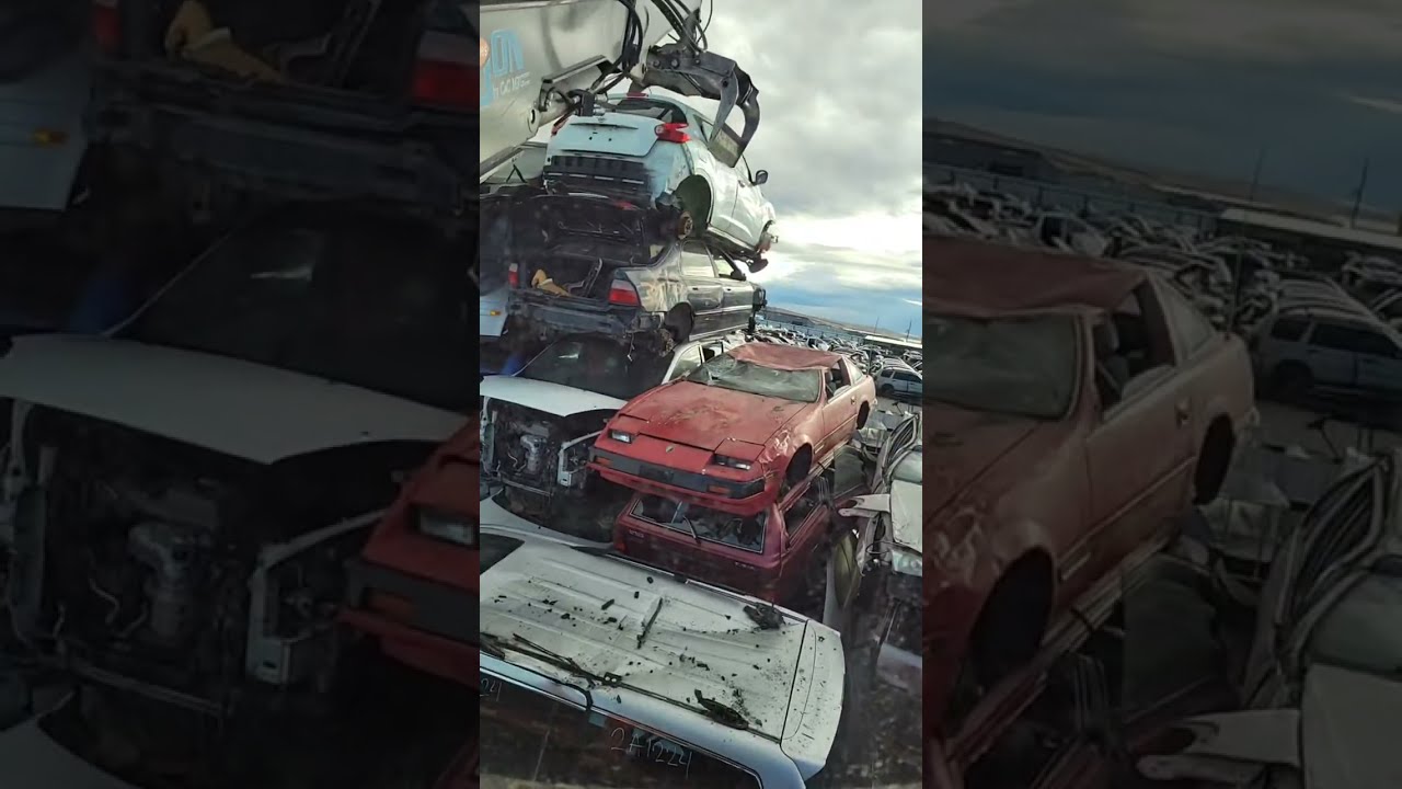 Smashing cars in a beller #automobile #cars #recycling #scrap #trucks #vans #claw #smash #doors ####
