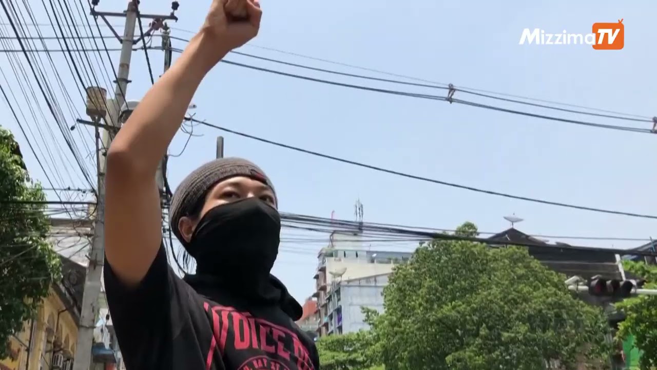 Yangon protesters return to streets in brief protest