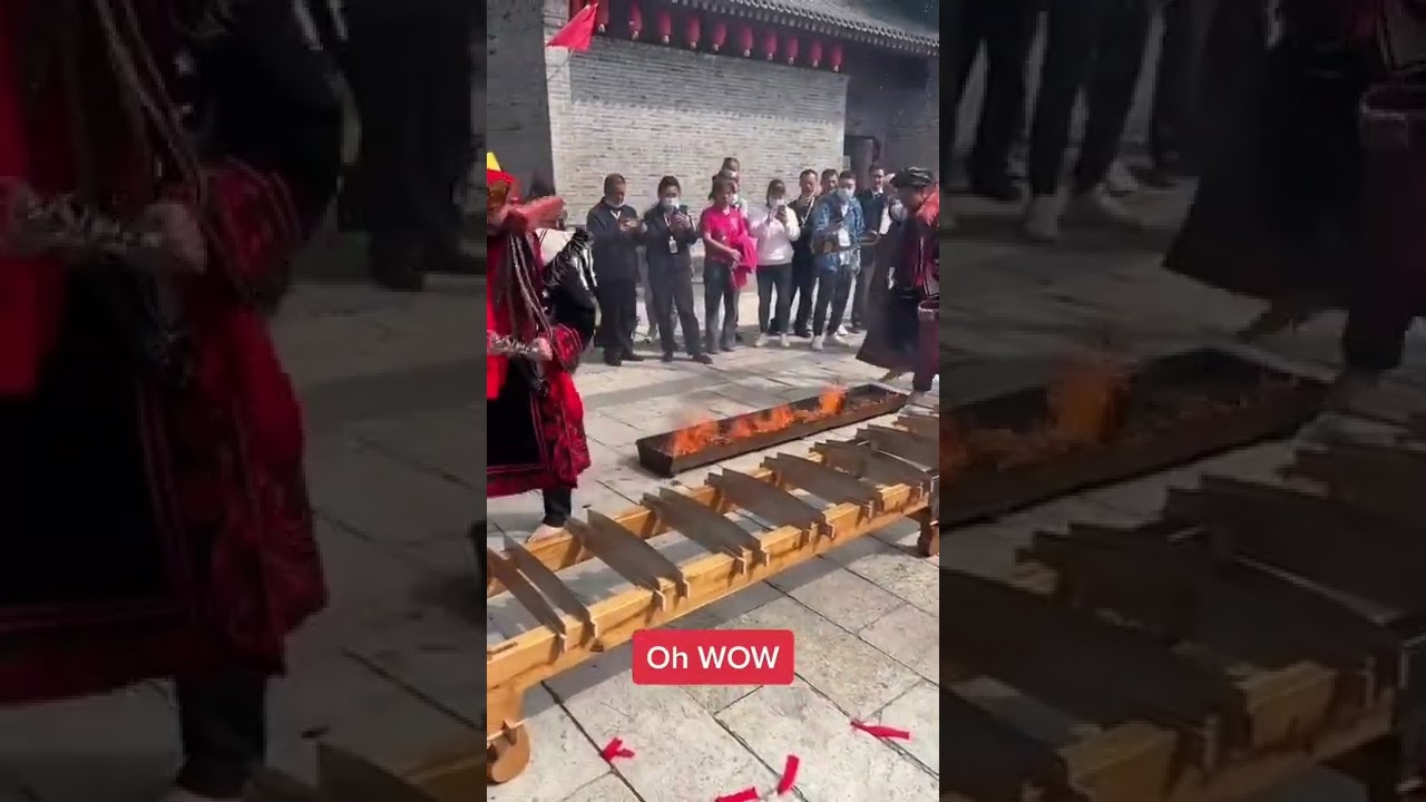 Shaolin Monk walks on burning hot coals